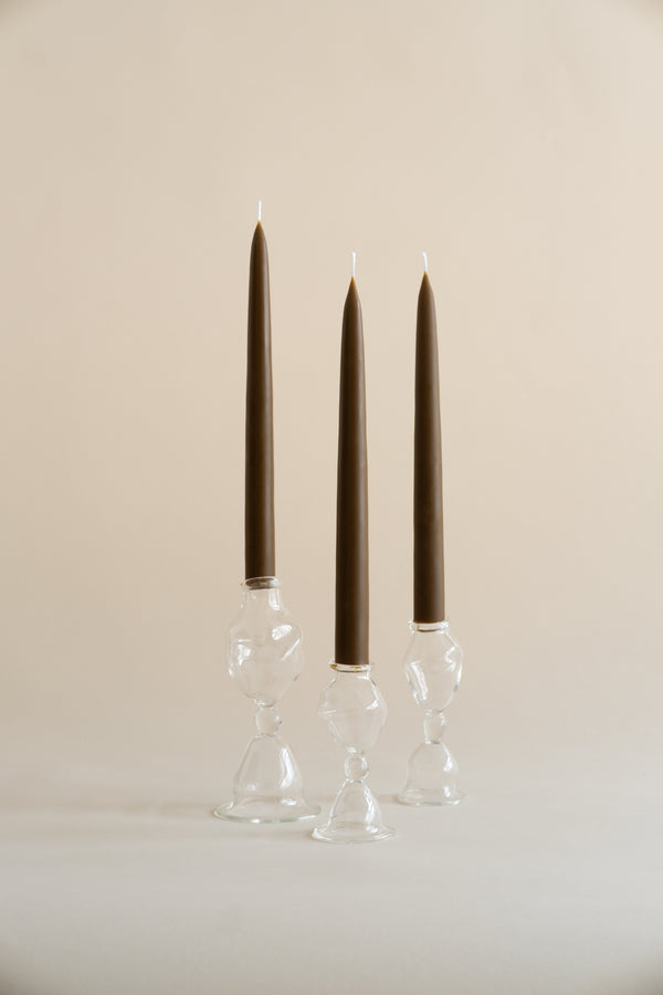 Set of three asymmetric glass candleholders